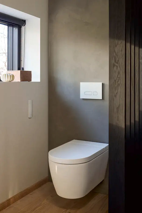 ME by Starck Wall Mounted Toilet Rimless  0.8/1.28 GPF, HygieneGlaze, White High Gloss